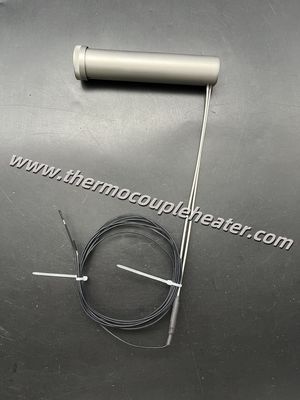 Calentador de bobina microtubular con boquilla de calefacción con orificios de bloqueo y termopar